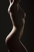 Side view of naked woman. 
Photo : Jan Scherders