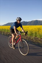 USA, Montana, Kalispell, Cyclist captured in motion. 
Photo: Noah Clayton