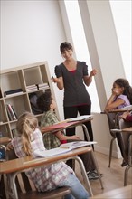 Teacher with schoolchildren (6-7,8-9). 
Photo : Rob Lewine