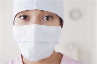 Portrait of doctor wearing surgical mask. 
Photo : Rob Lewine