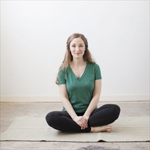 Young woman practicing yoga. 
Photo: Jessica Peterson