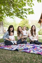 USA, Utah, Salt Lake City, Three young mothers with two baby boys (6-11 months) and toddler boy
