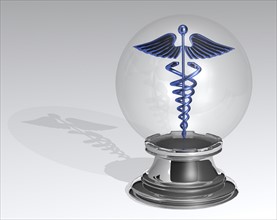 Crystal ball with Caduceus inside. 
Photo : Calysta Images