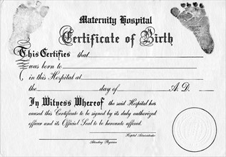 Studio shot of certificate of birth. 
Photo: Calysta Images