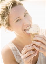 Woman eating ice cream.