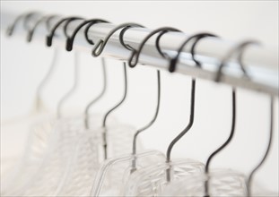Coat hangers on clothes rack. Photo : Jamie Grill