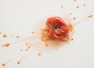 Studio Shot of smashed tomato. Photo: Jamie Grill