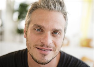 Portrait of happy young man. Photo : Jamie Grill