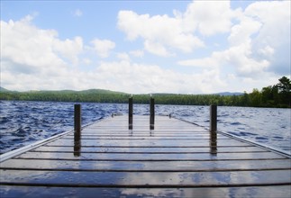 View of lake with wooden jetty. Photo : Daniel Grill