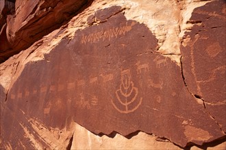 USA, Utah, Native American art on stone wall. Photo : John Kelly