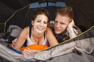 Portrait of hikers in tent. Photo: Mike Kemp