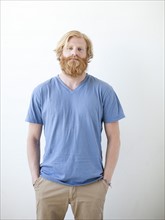 Studio portrait of man with beard. Photo : Jessica Peterson