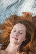 Portrait of woman sleeping. Photo : Tetra Images