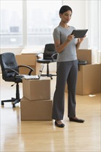 Businesswoman moving office.