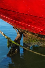 Detail of red tugboat.