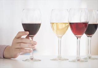 Glasses with red, rose and white wine.