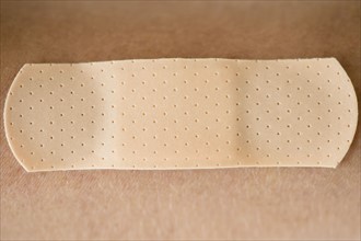 Studio shot of adhesive bandage. Photo : Jamie Grill