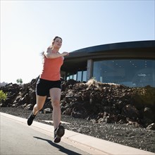 Young woman jogging.