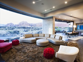 Modern living room interior facing terrace. Photo: Erik Isakson