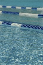 part of swimming lane markers on swimming pool. Photo : Tetra Images