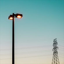 Street light and electricity pylon. Valdese, North Carolina.