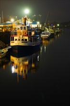 Boats in Harbor at night. Portland, Maine.