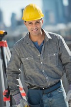 Portrait of engineer in construction site.
