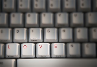 Studio shot of keyboard with word 'love' on it