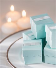 Pastel composition with gifts packages and candles