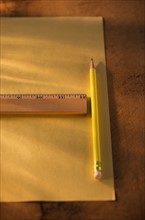 Elevated view of ruler, pencil and paper sheet