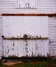 Weathered white barn door