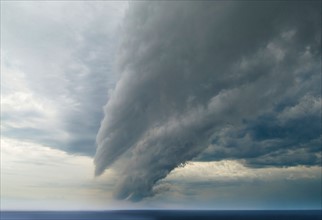 Storm cloud over sea
