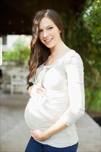 Portrait of pregnant mid adult woman. Photo : Jessica Peterson