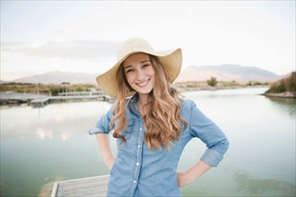 Portrait of young woman wearing hat. Photo : Jessica Peterson