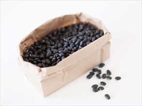 Carton of beans on white background. Photo: Jessica Peterson