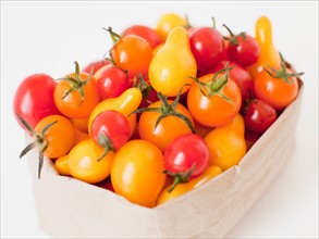 Studio Shot of Cherry Tomatoes in paper bag. Photo: Jessica Peterson
