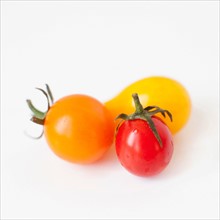 Studio Shot of three Cherry Tomatoes. Photo: Jessica Peterson