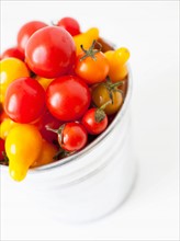 Studio Shot of Cherry Tomatoes in plastic container. Photo: Jessica Peterson