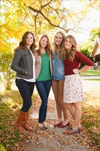 Full length portrait of four friends. Photo: Jessica Peterson