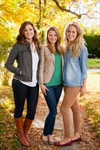 Portrait of three young women in autumn day. Photo : Jessica Peterson