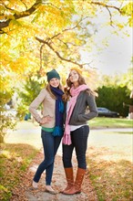 Portrait of two young women in autumn day. Photo: Jessica Peterson