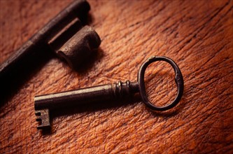 Antique keys on wood.
