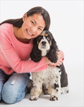 Portrait of teenage girl ( 16-17 years) with dog