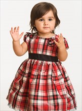 Baby girl ( 6-11 months) wearing plaid dress
