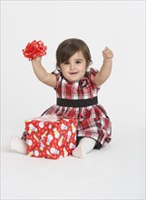 Portrait of Baby girl ( 6-11 months) with gift box