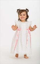 Baby girl ( 6-11 months) wearing white dress