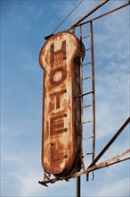 Rusty hotel sign