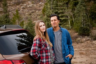 Portrait of young couple during road trip