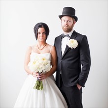 Studio Shot portrait of bride and groom