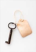 Antique key with tag.